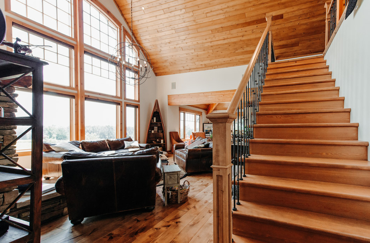 009-brookfield-post-beam-cedar-homes-stairway-livingroom